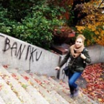 Laura climbing stairs in Prague, Czech Republic